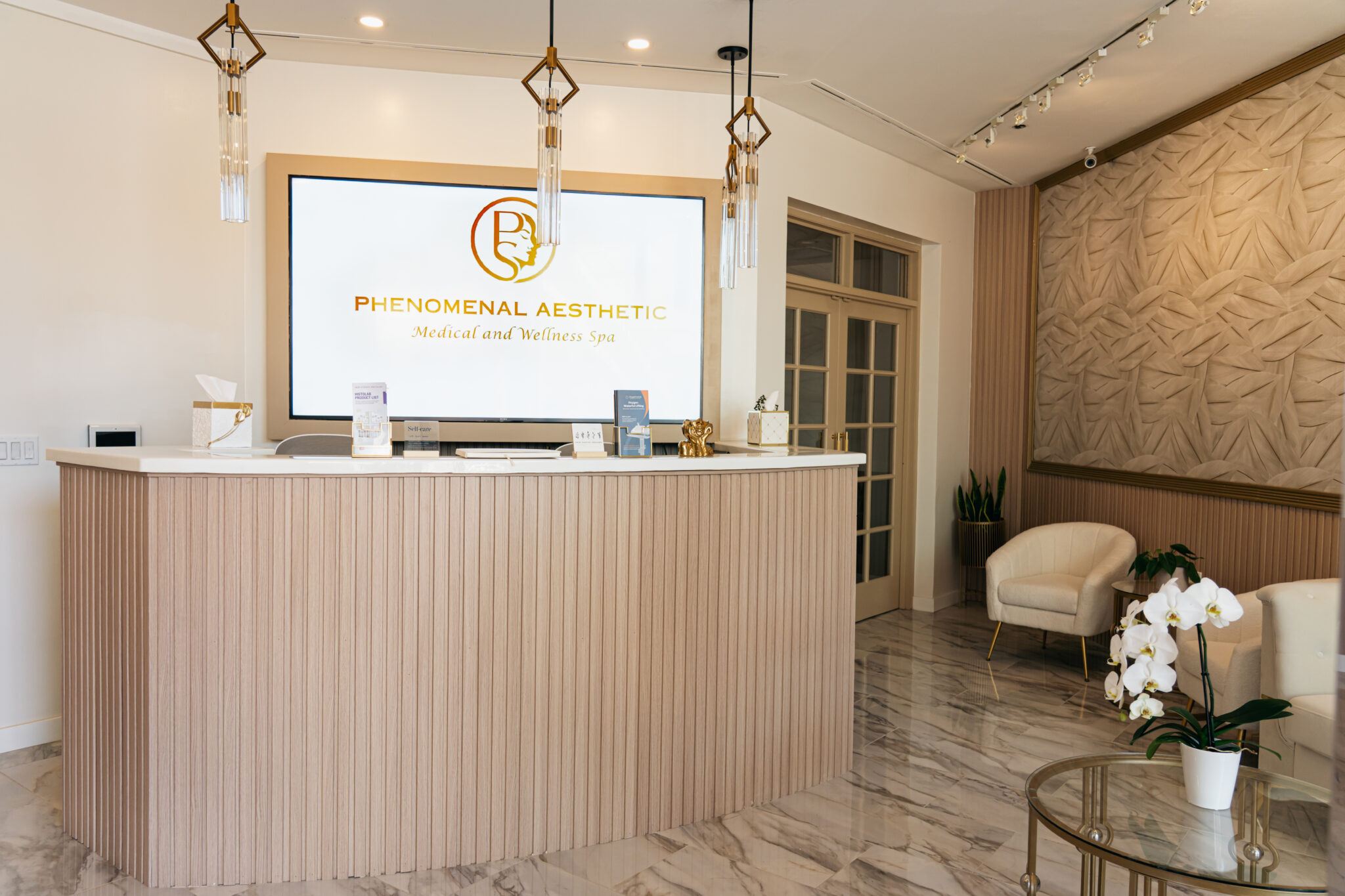 Clean, professional medical spa treatment room with neutral tones at Phenomenal Aesthetic Medical and Wellness Spa in Encino